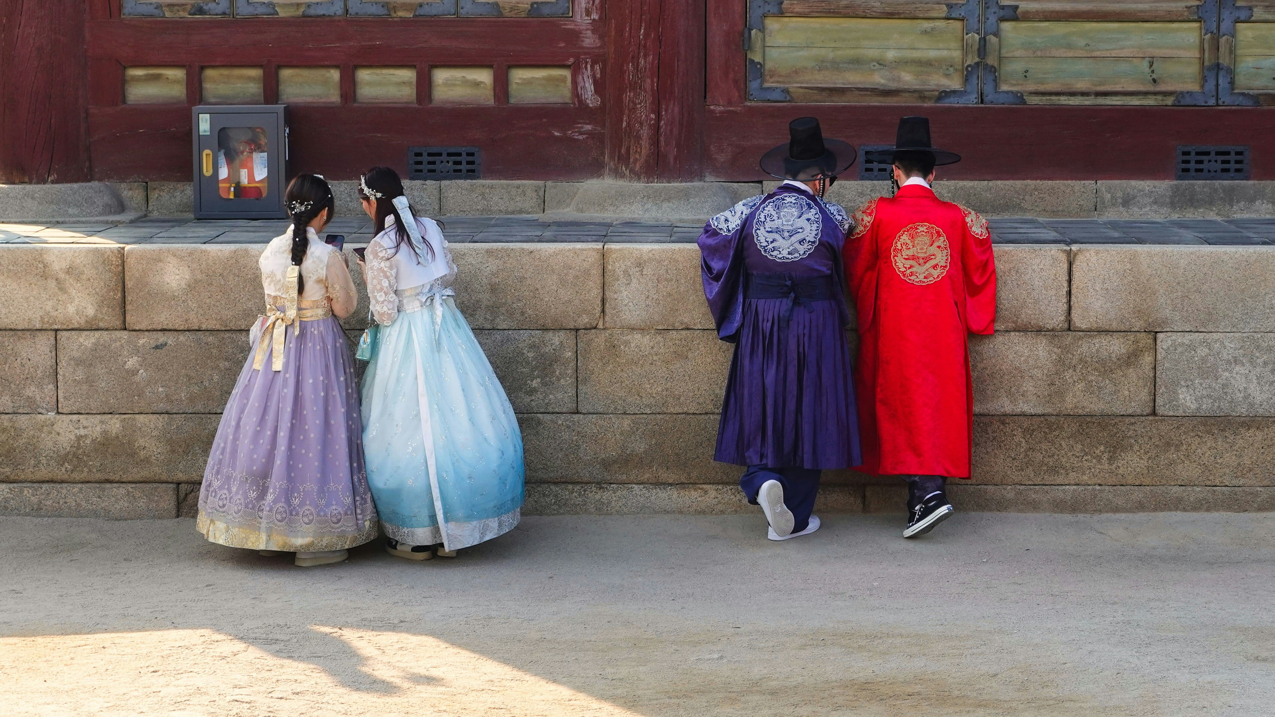 a group of people standing next to each other